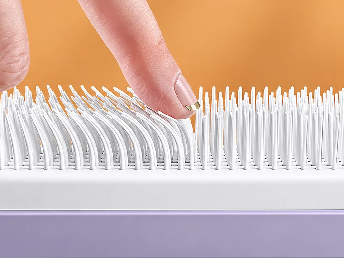 Close-up of the VAYLIORA hairbrush bristles, light purple